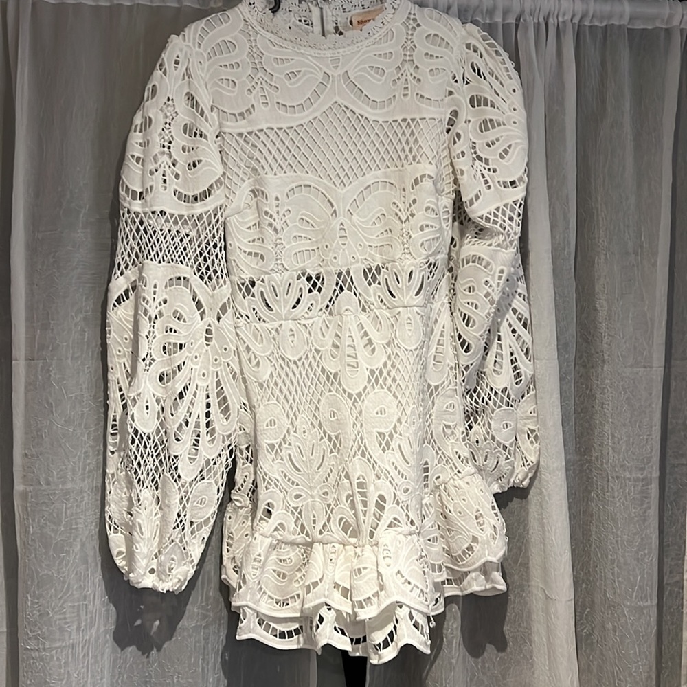 Beautiful graduation or engagement dress. Fits true to size.